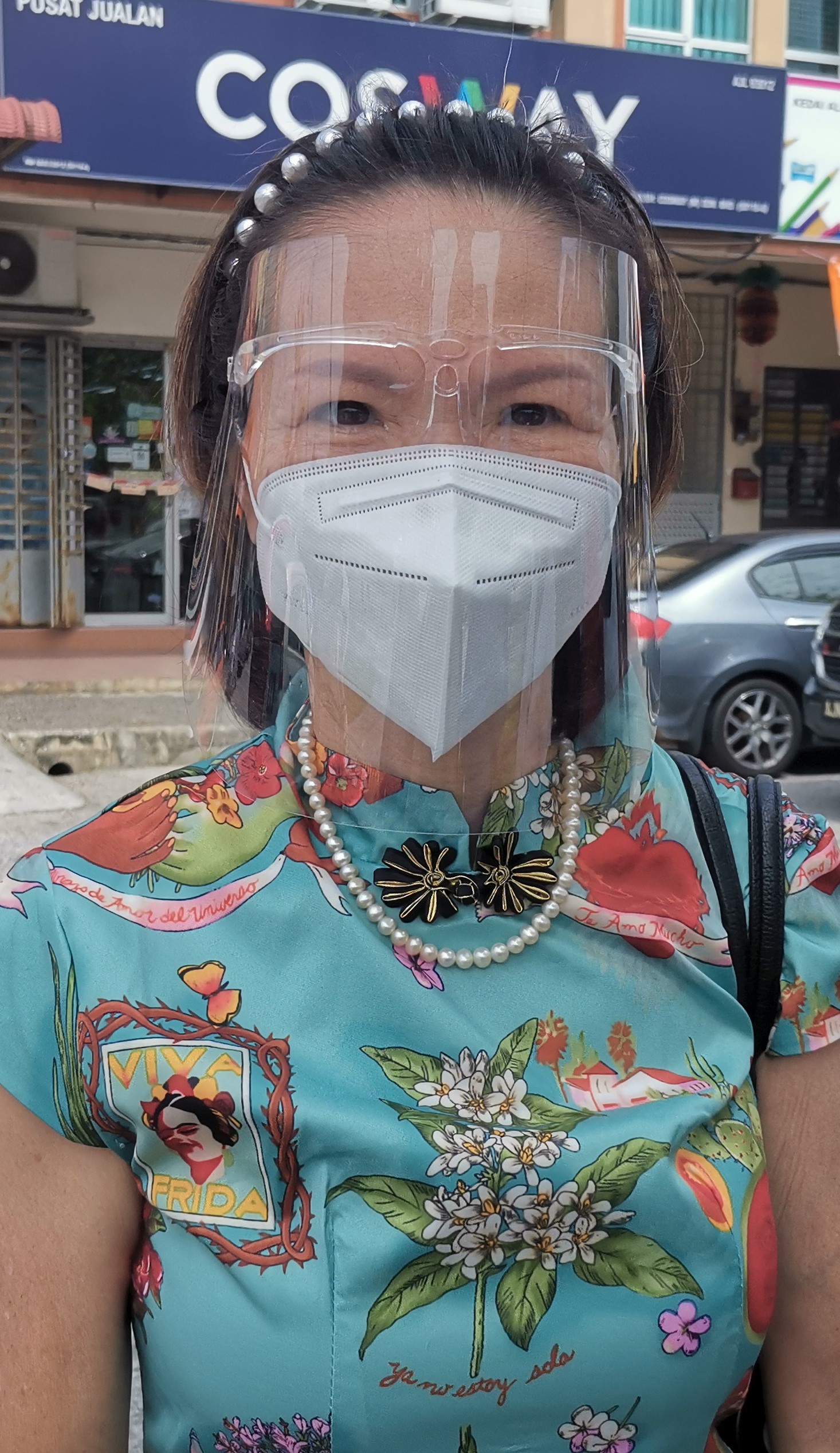 社区动态/万里镇店铺主要出入口被封 商家反对望收回成命