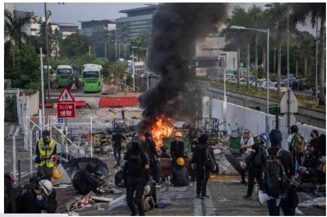 看世界  反修例港中大学生暴动罪成 5人各判刑近5年