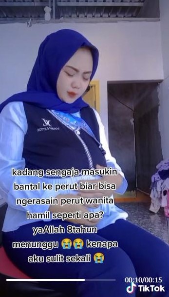 苦盼8年无法怀孕 女子塞枕头感受肚子隆起