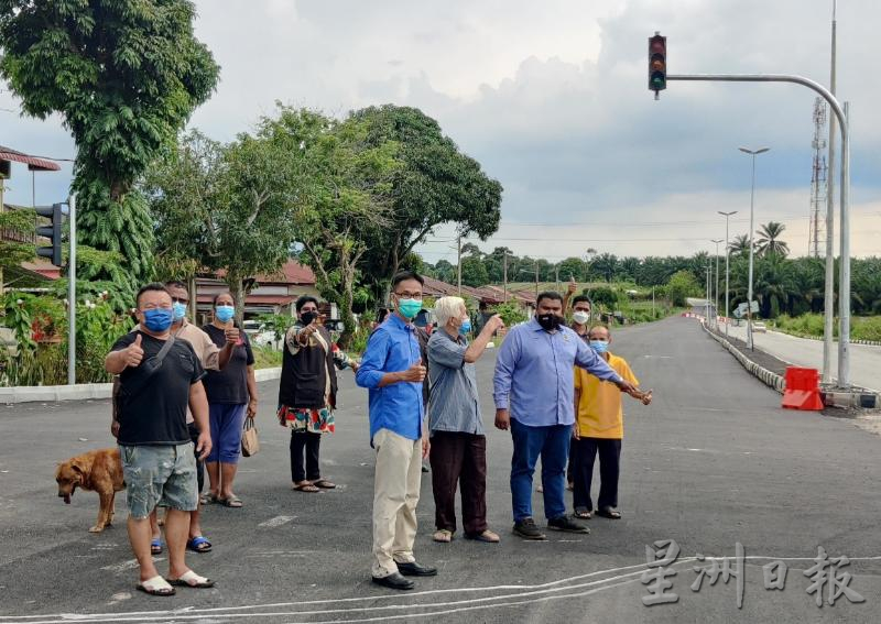 霹:曾吉京丁新村前红毛丹路已开拓为双车道