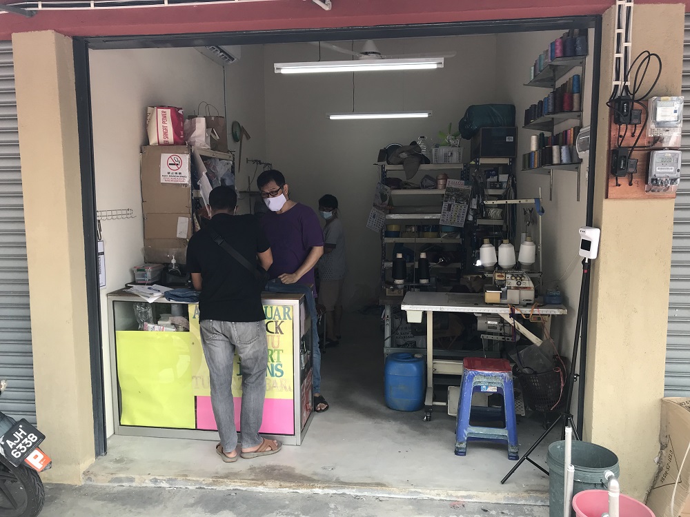 霹:版头/二十多个老店铺业者陆续离开老店迁入巴士终站后面新店