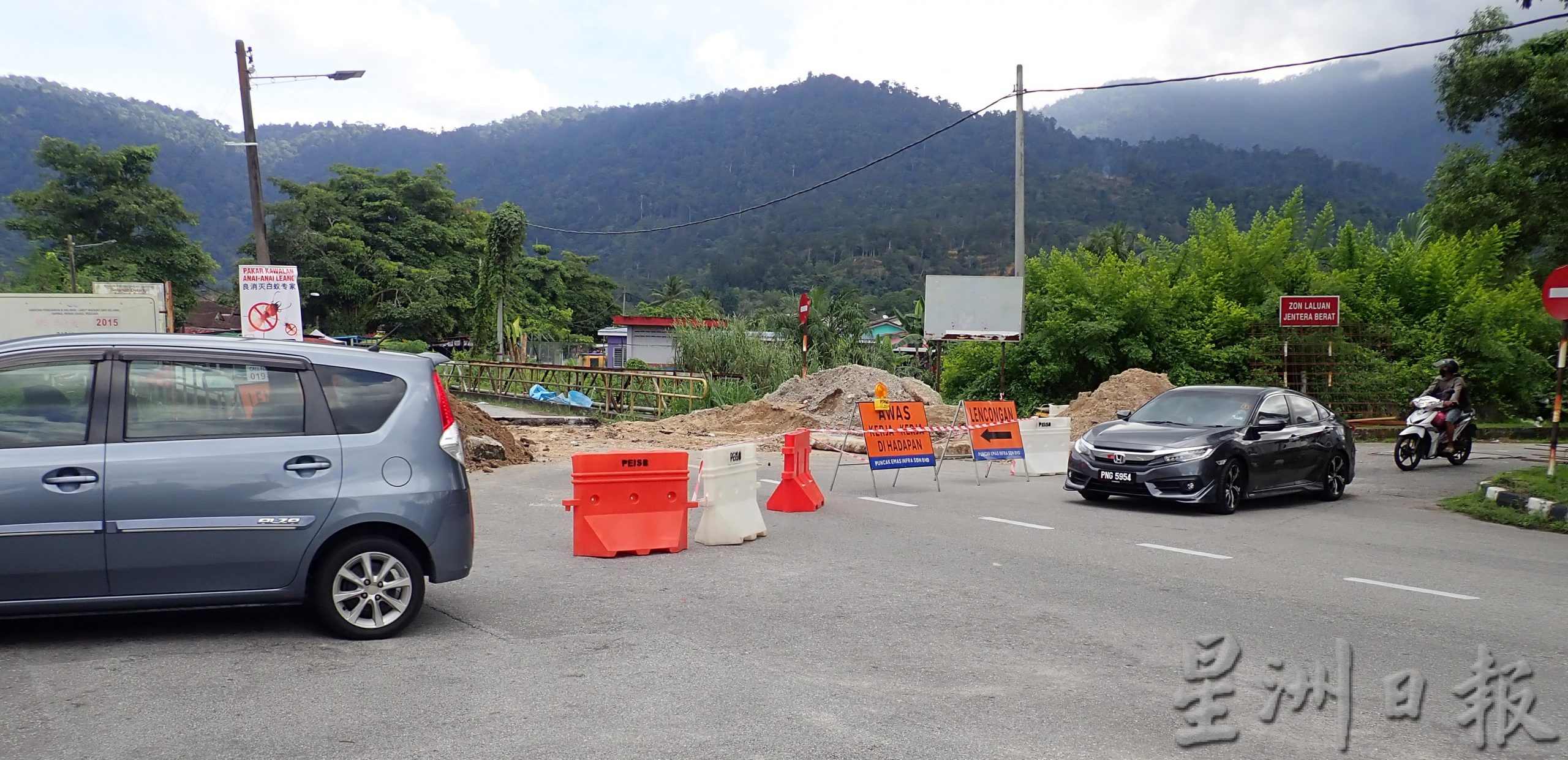 霹/抢修桥樑破洞 查纳花园道路暂关14天
