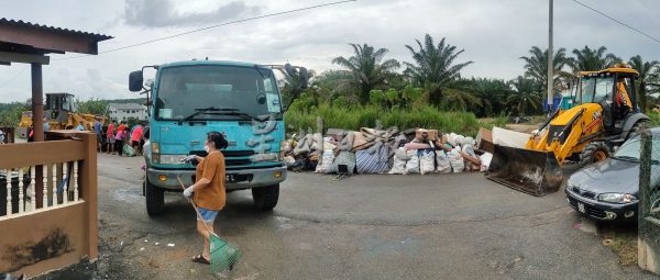 供FB/多一分同理,少一分苛责!丹A灾黎抱同理心,助SWM清垃圾