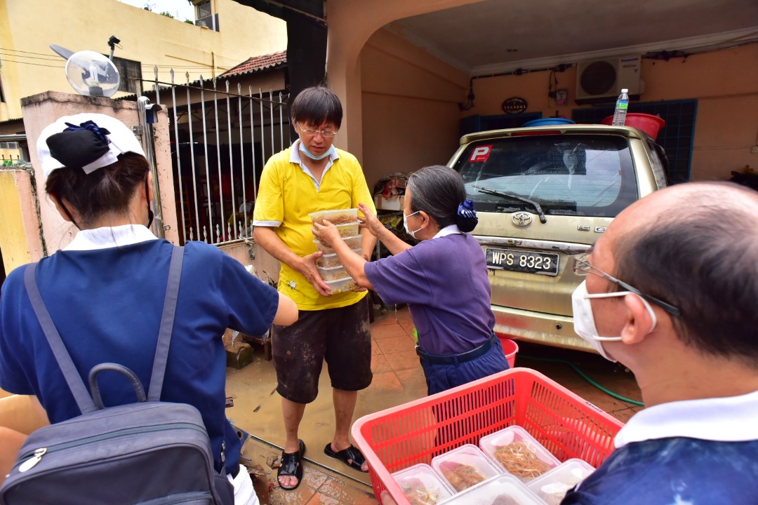 暖势力/慈济雪隆分会协助水灾灾民