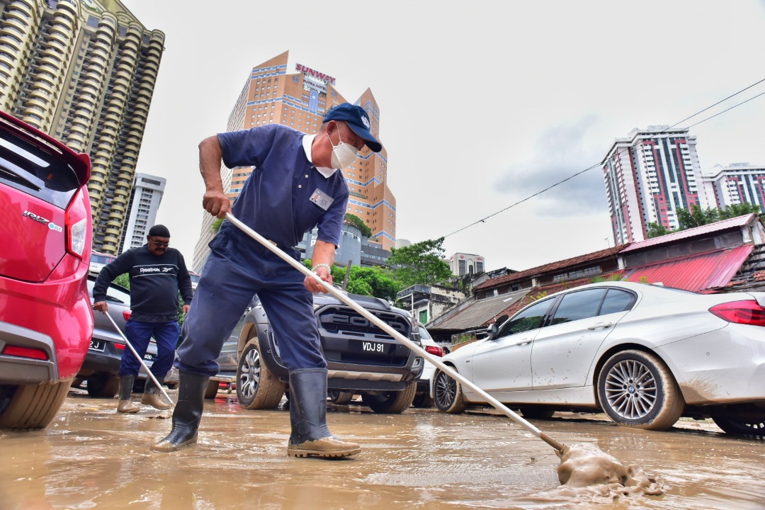 暖势力/慈济雪隆分会协助水灾灾民