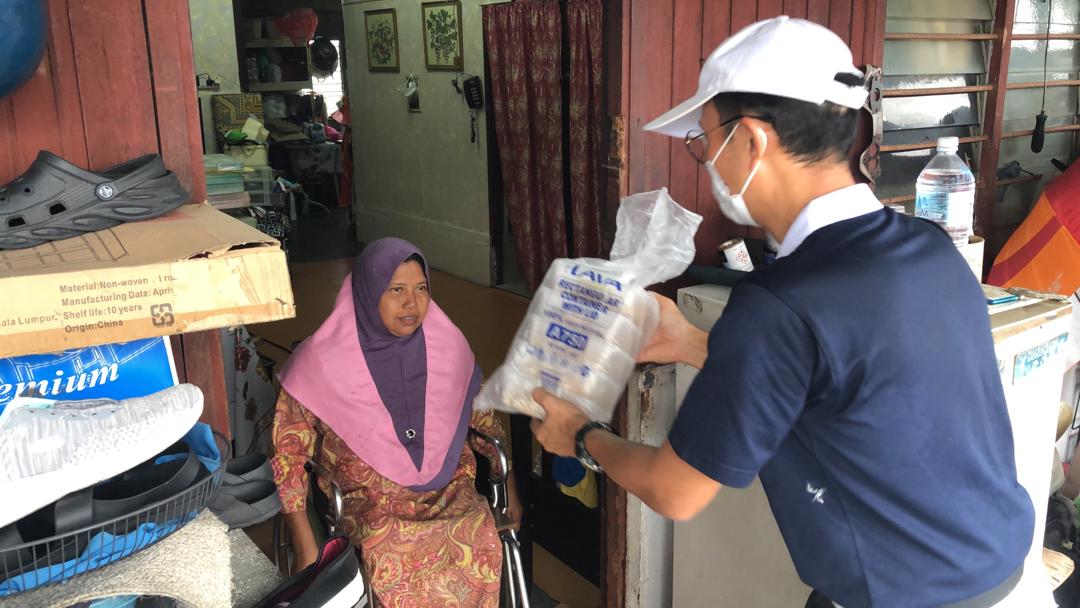 暖势力/慈济雪隆分会协助水灾灾民