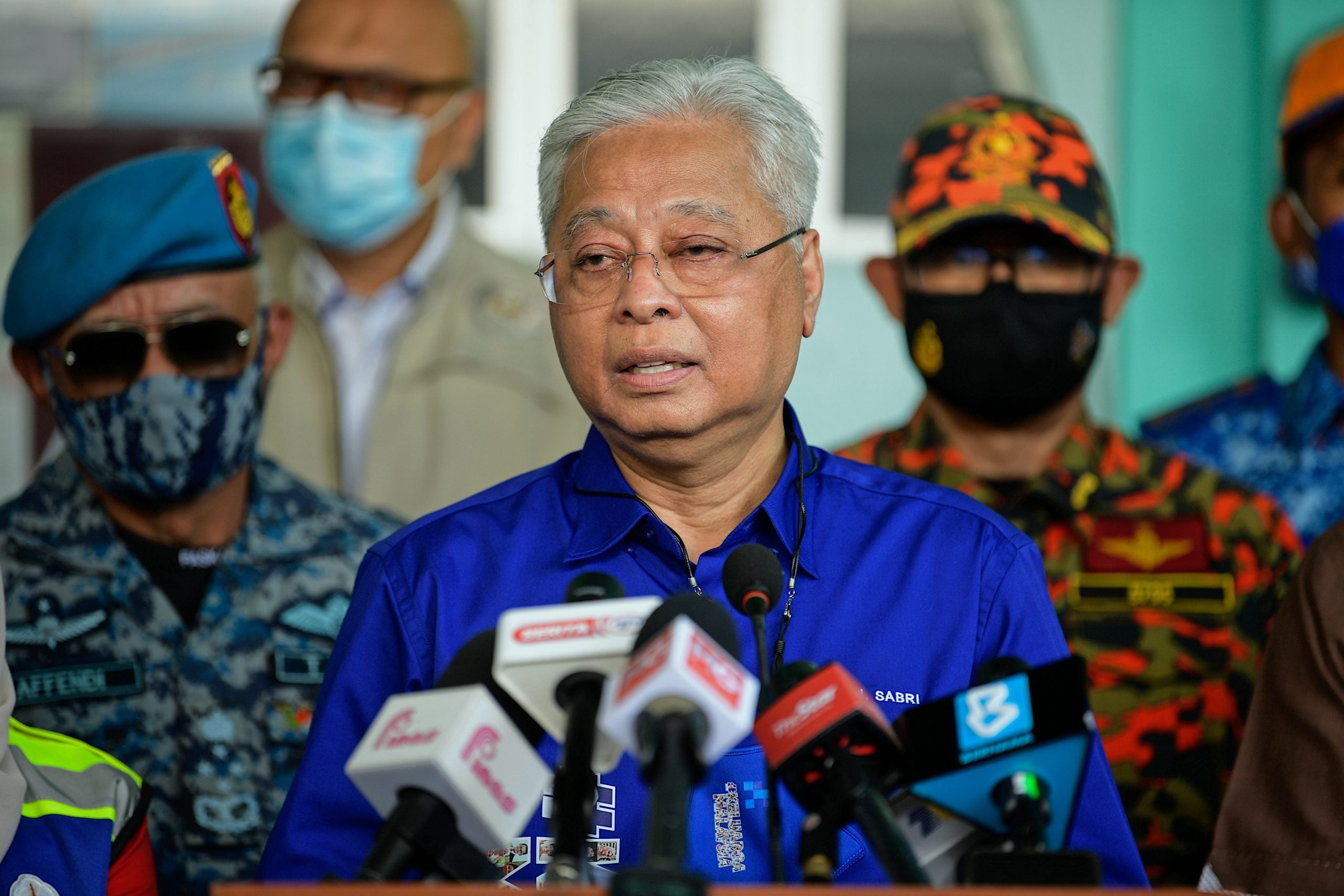 首相拒绝巫青团要求·不允灾民提1万令吉公积金