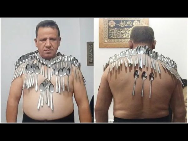 伊朗男身体贴85支汤匙 打破世界纪录