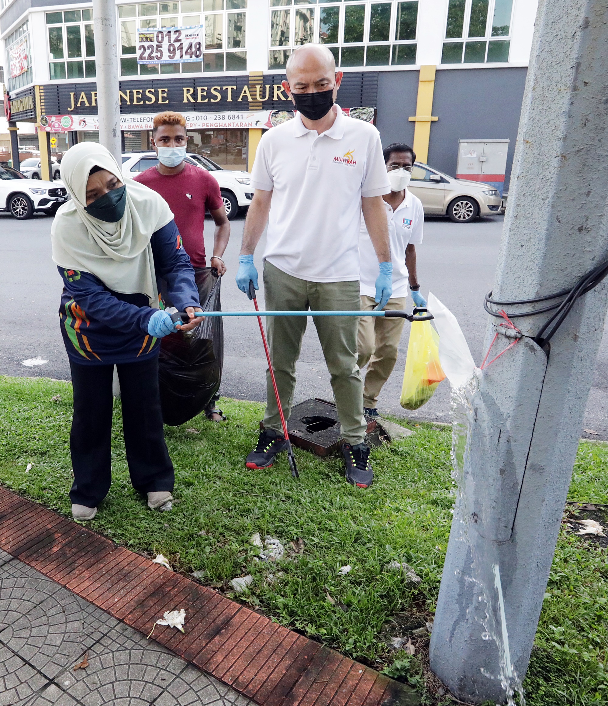大都会/林立迎举办拾垃圾活动