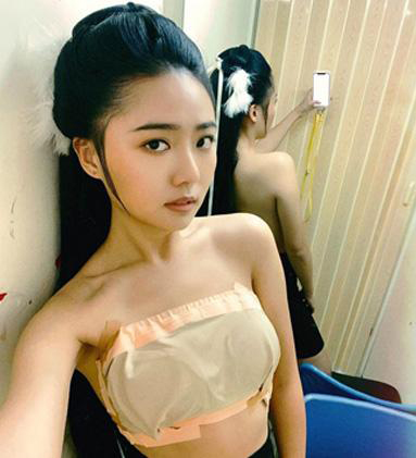 戴祖仪解开半裸之谜 牛皮封箱胶纸封胸