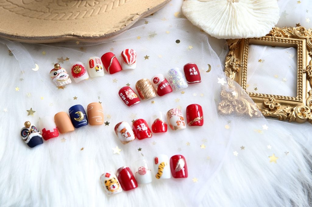 霹:20日见报/封底主文/【乐活频道】/新年美甲.应节Q版小老虎跃指尖萌萌哒