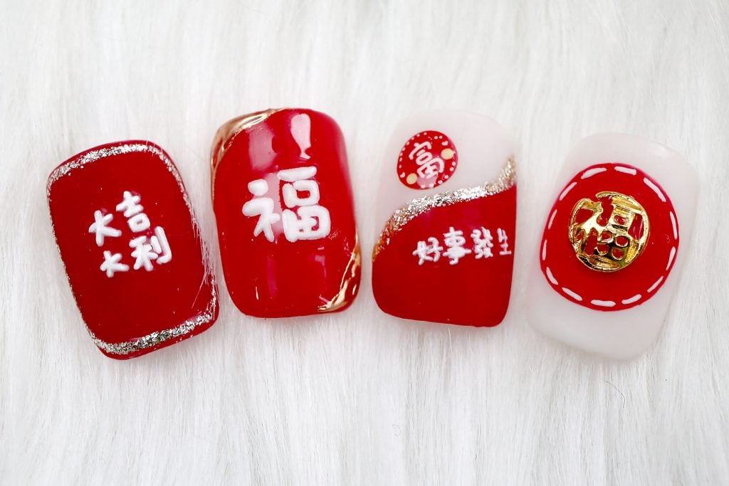 霹:20日见报/封底主文/【乐活频道】/新年美甲.应节Q版小老虎跃指尖萌萌哒