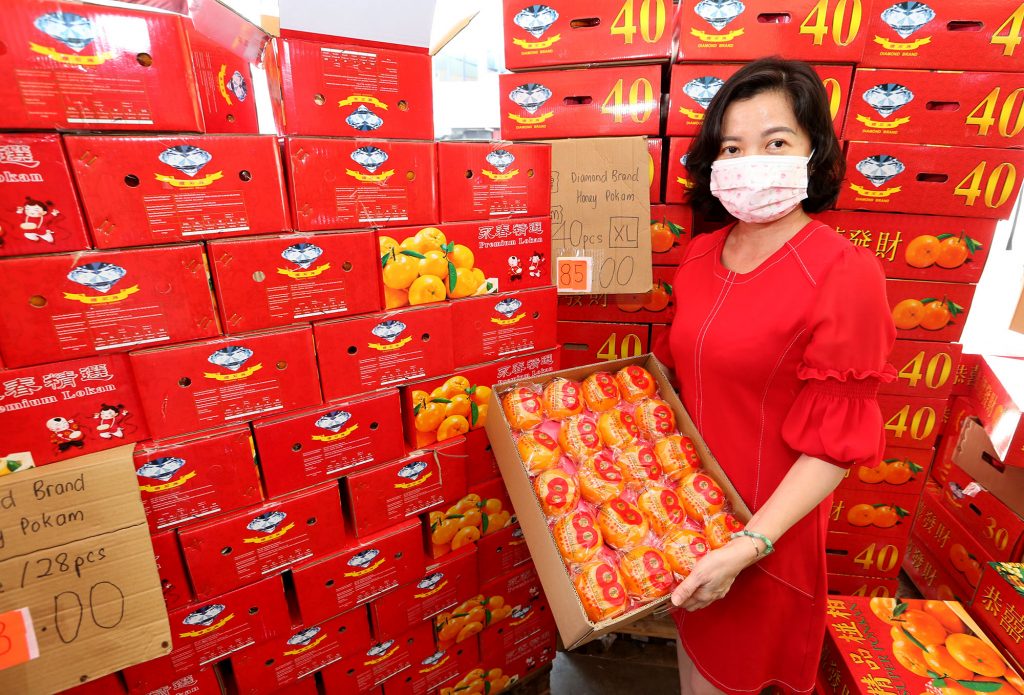 霹:封面主文/年柑年花最后冲刺 部分年货断市 市道后劲十足