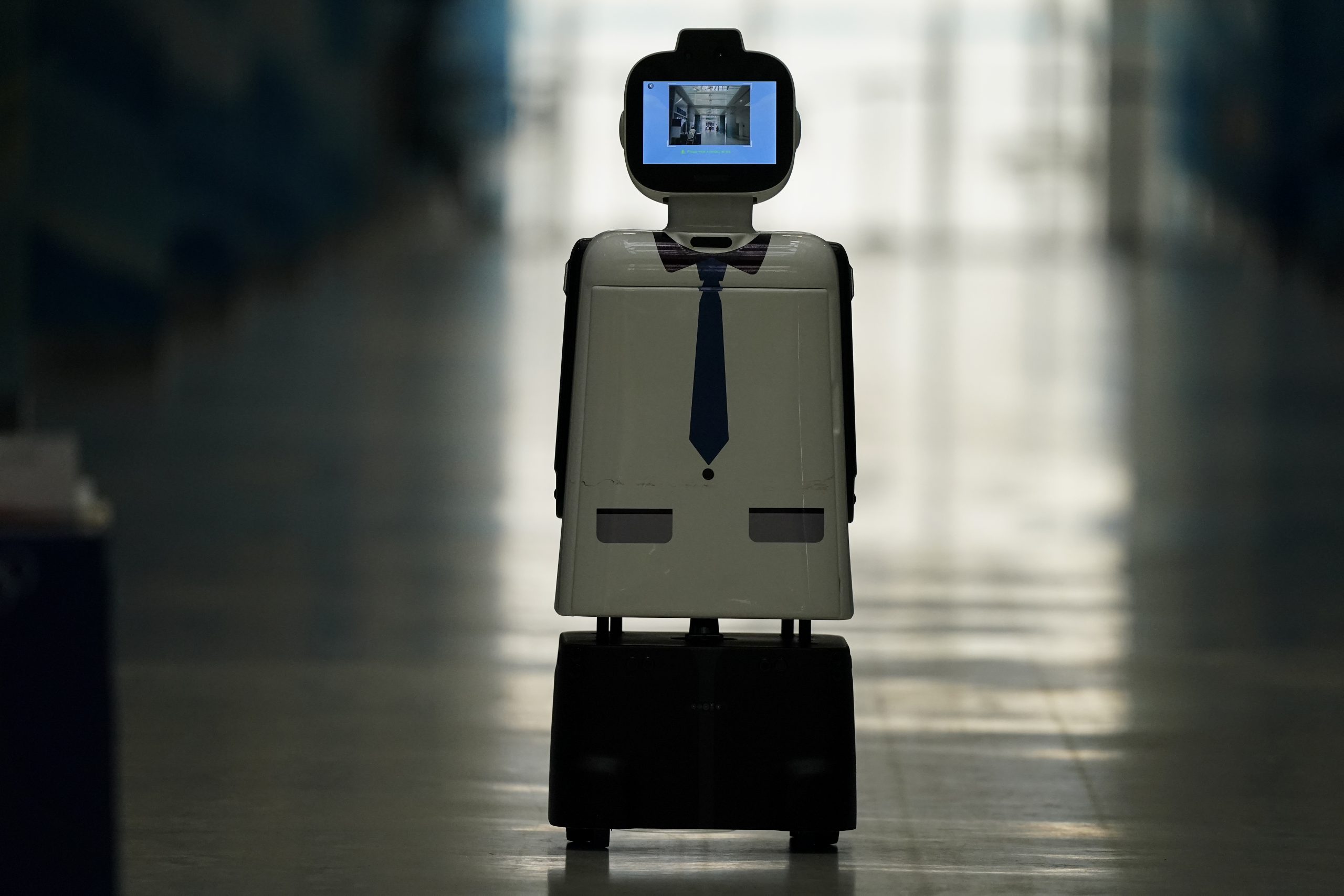 拚图)冬奥会迎来黑科技,智能机器人上岗防疫