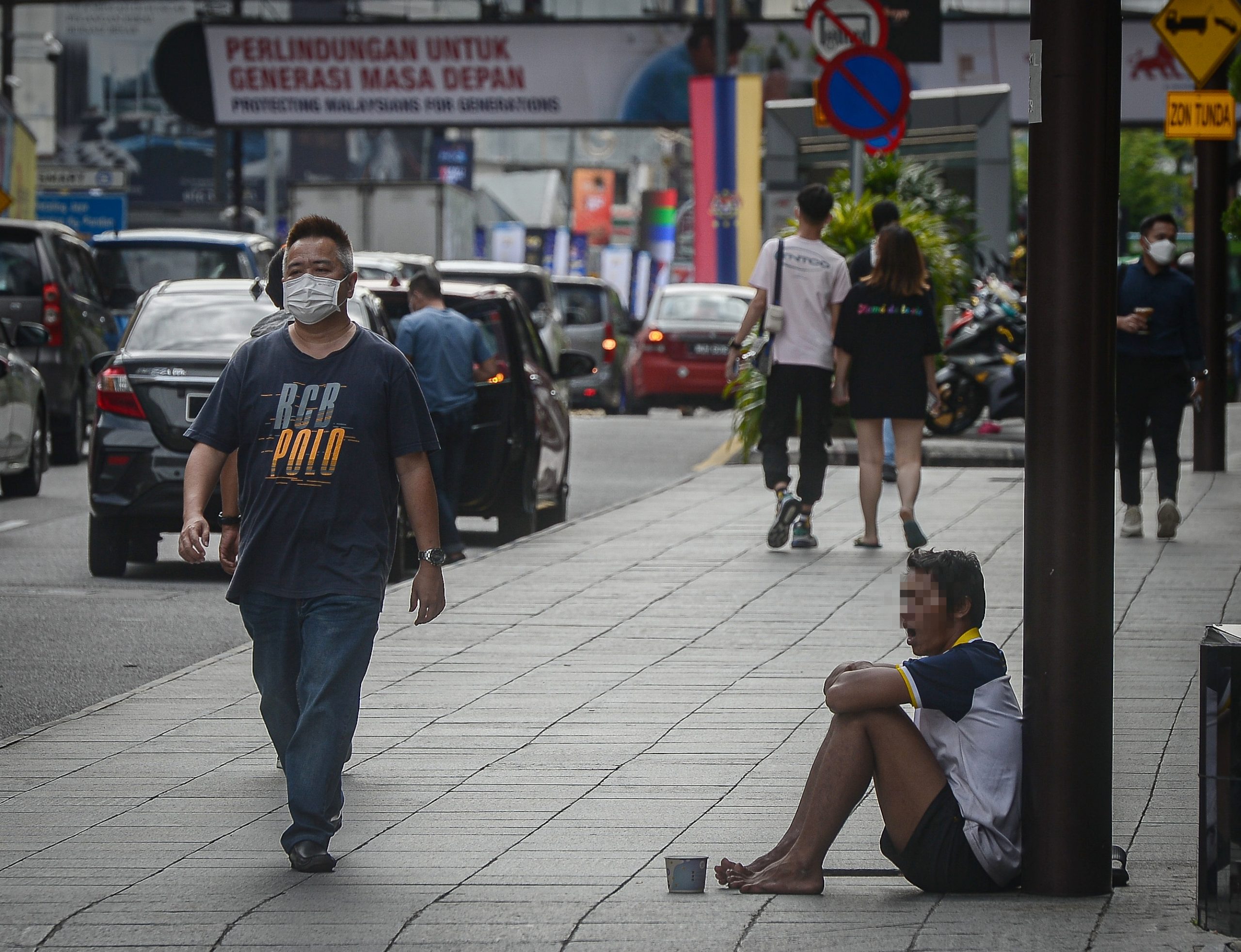 （大都会）/封面/跟进吉隆坡乞丐问题/12图