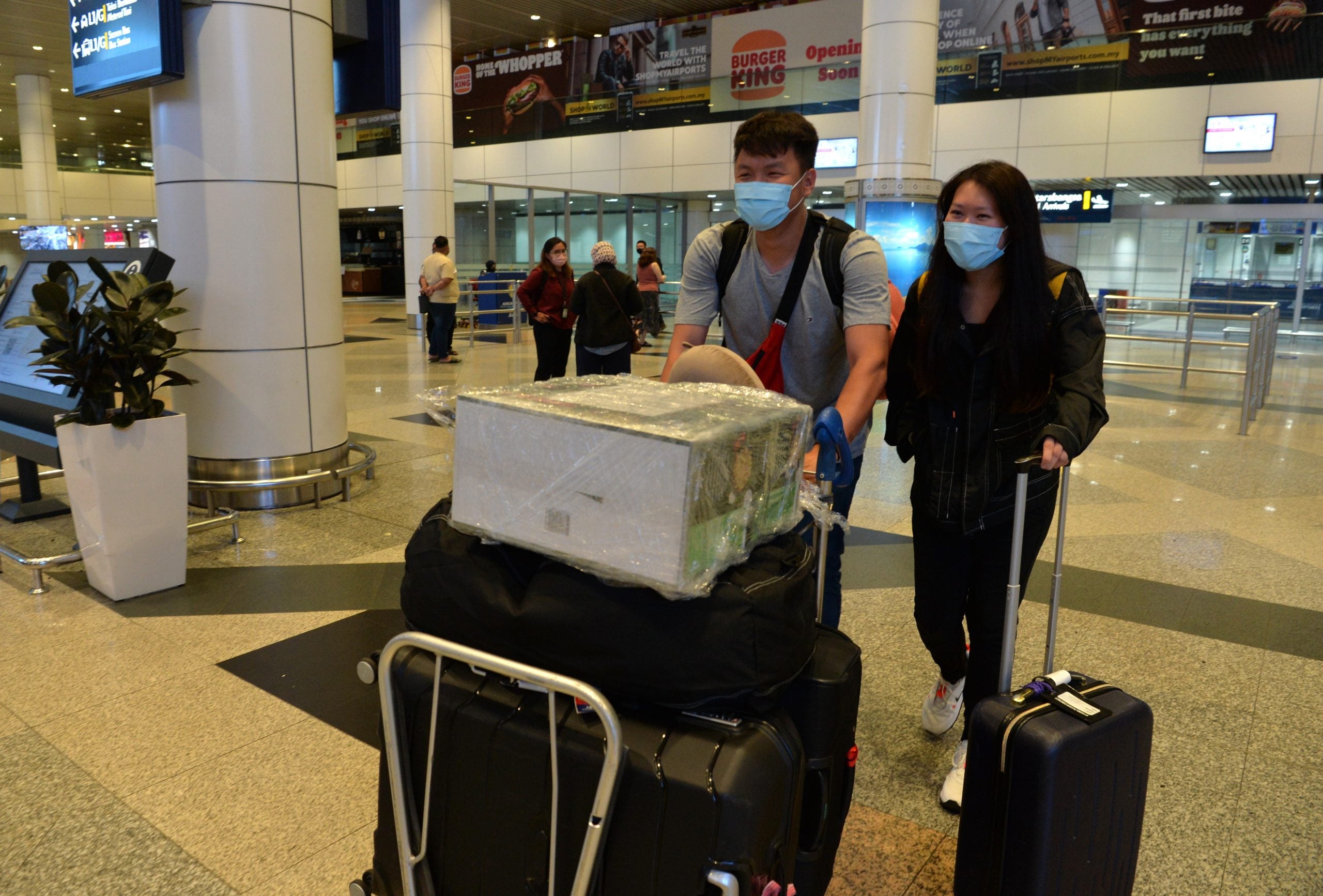 从澳洲墨尔本回国的26岁软件工程师黄豪俊