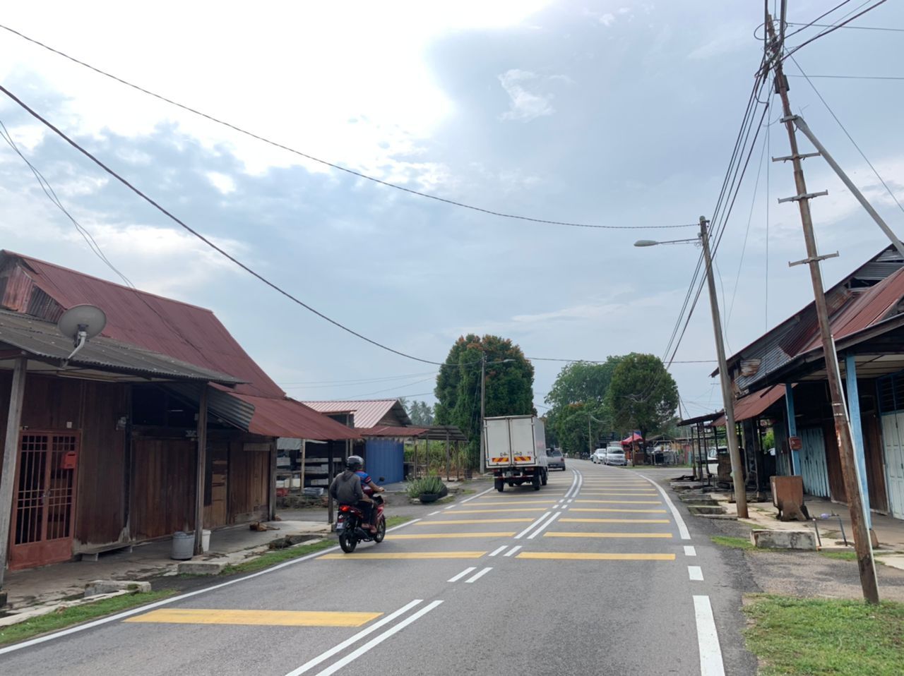 （古城封底主文）乡镇情深：武吉南眉发展木基工业 新村村民生活写意