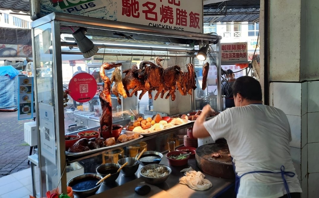 封面副文-大都会/肉鸡供应紧张,鸡饭贩见步行步/4图