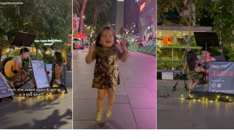 暖势力|学弹唱儿歌“鲨鱼宝宝” 街头艺人逗乐小女孩