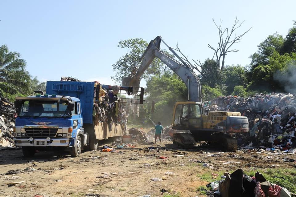 大都会:非法经营垃圾与旧衣回收业者遭取缔/7图