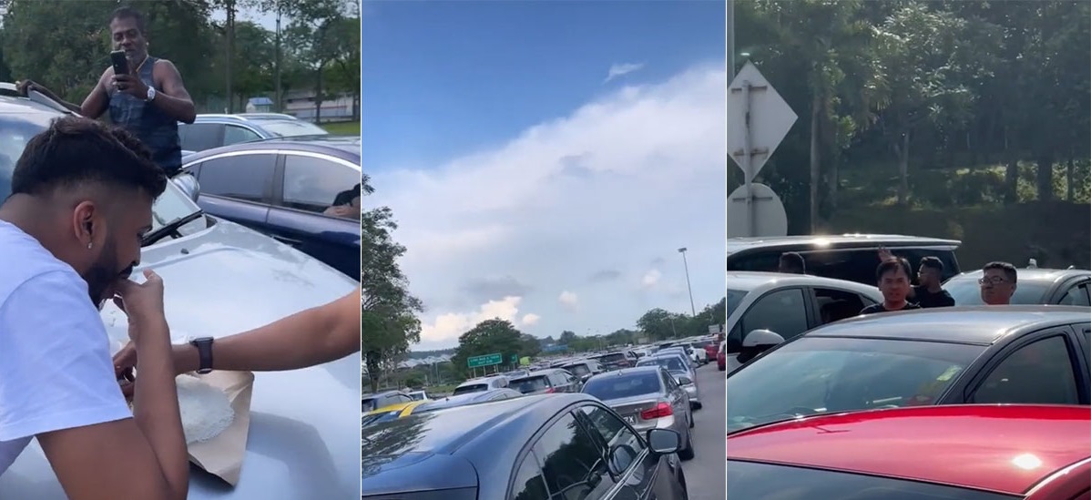 *已签发*柔：狮城二三事：受困车龙苦中作乐拍视频 男子分享苦等时做的事