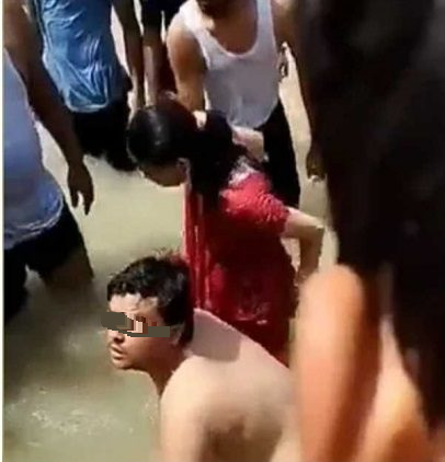 视频|男女“圣河”泡水秀恩爱 民众“眼红”呼巴掌围殴