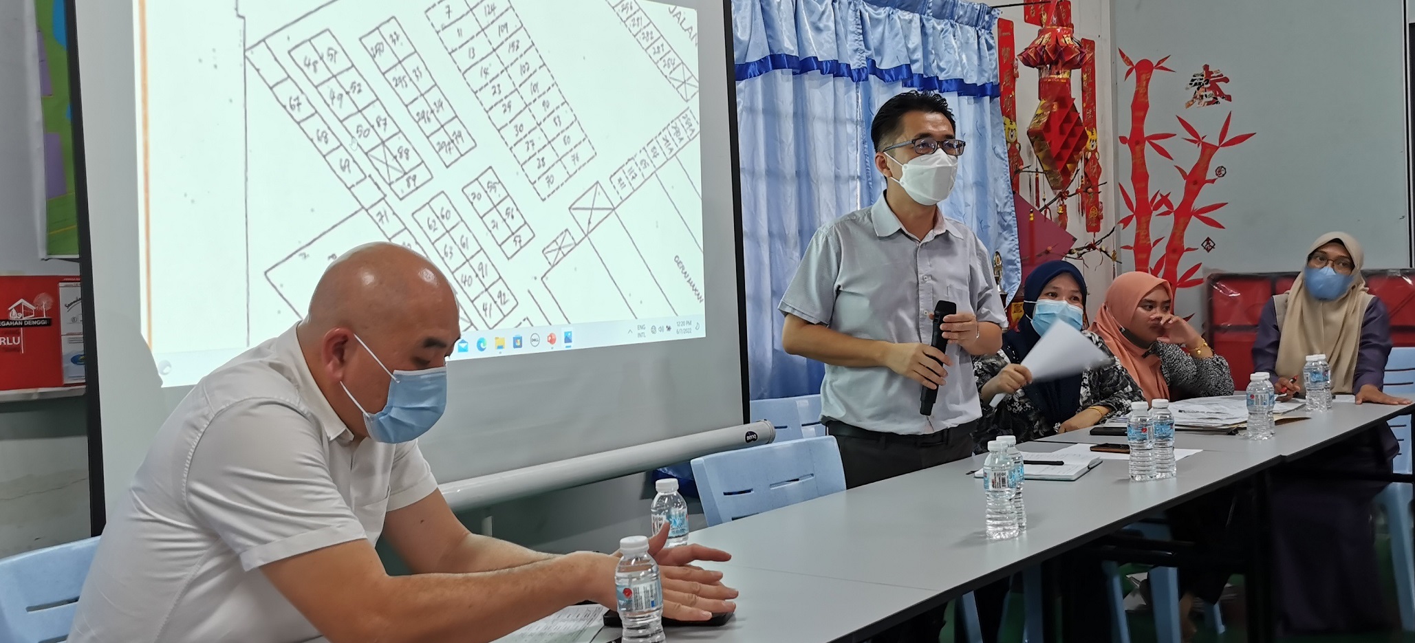 瓜冷市会商露天档位重划 与多数仁村小贩达共识