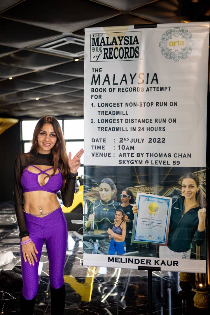 跑步机上跑25小时刷2纪录 美琳德尔用汗水献爱
