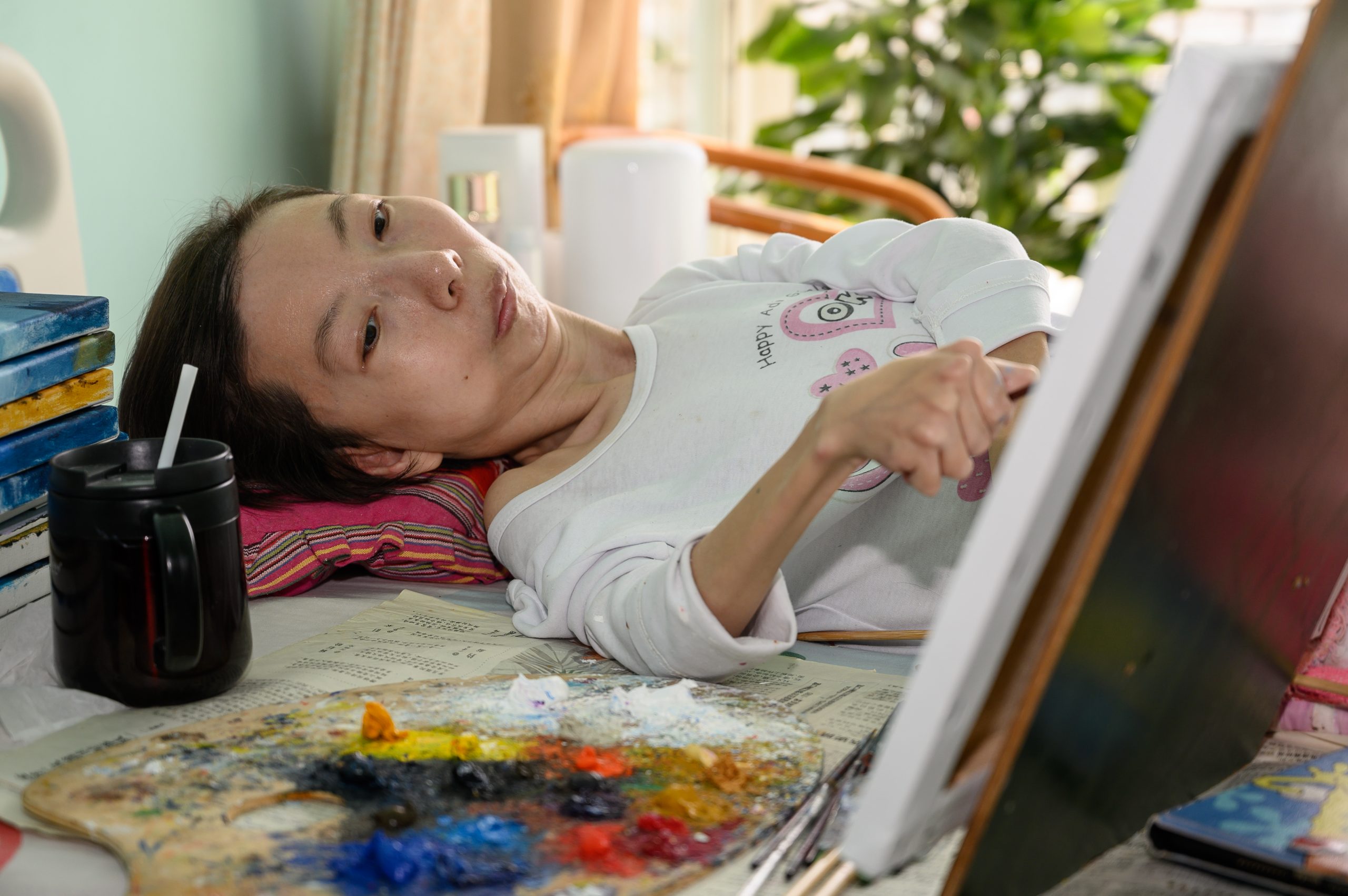 拼盘/“折翼”画家的个人画展圆梦记