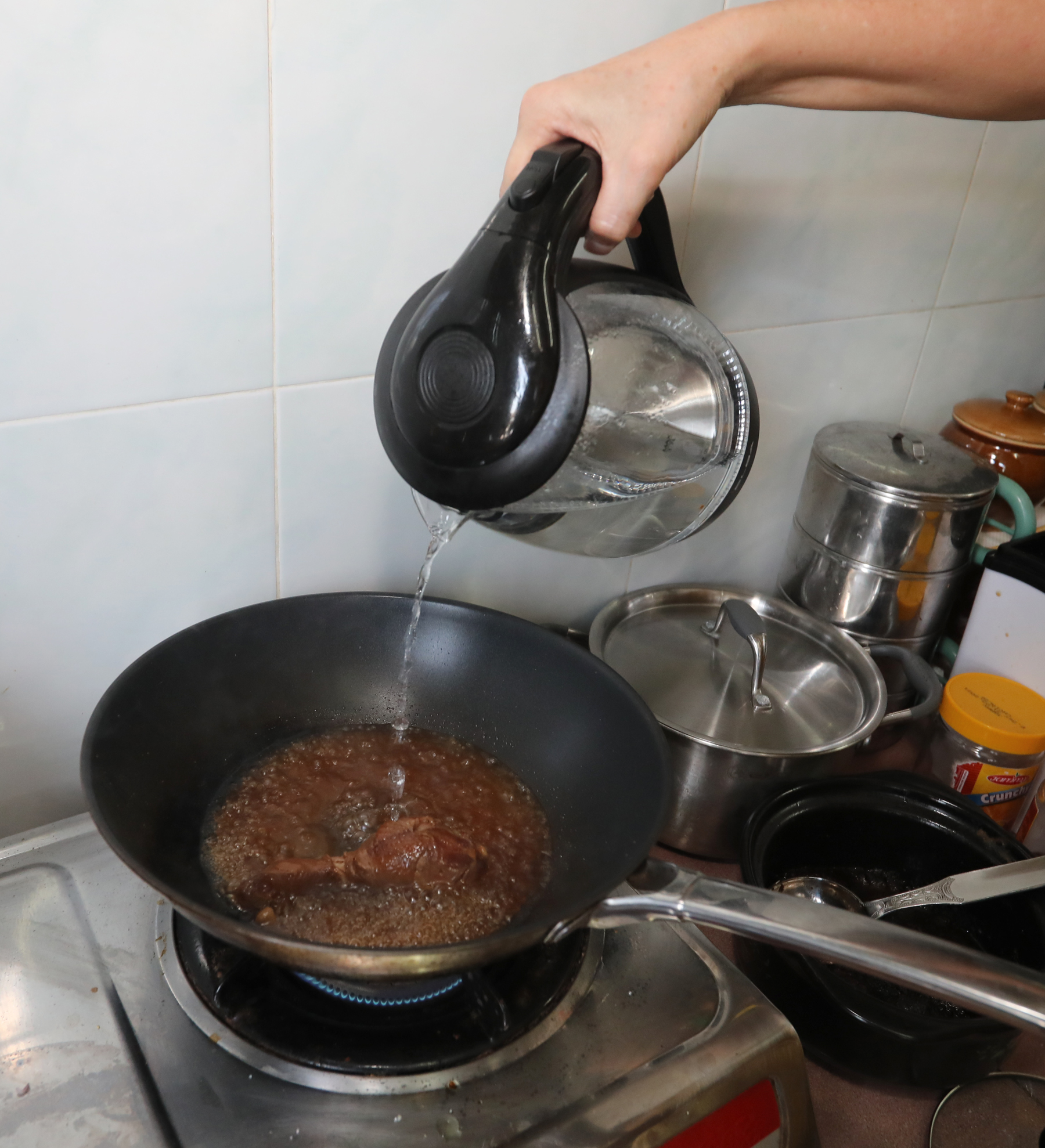 郭美丽传承前人手艺,自小学习不同传统风味菜肴