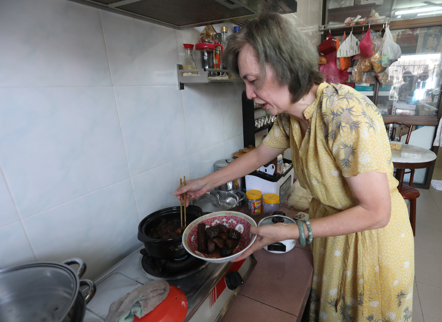 郭美丽传承前人手艺,自小学习不同传统风味菜肴