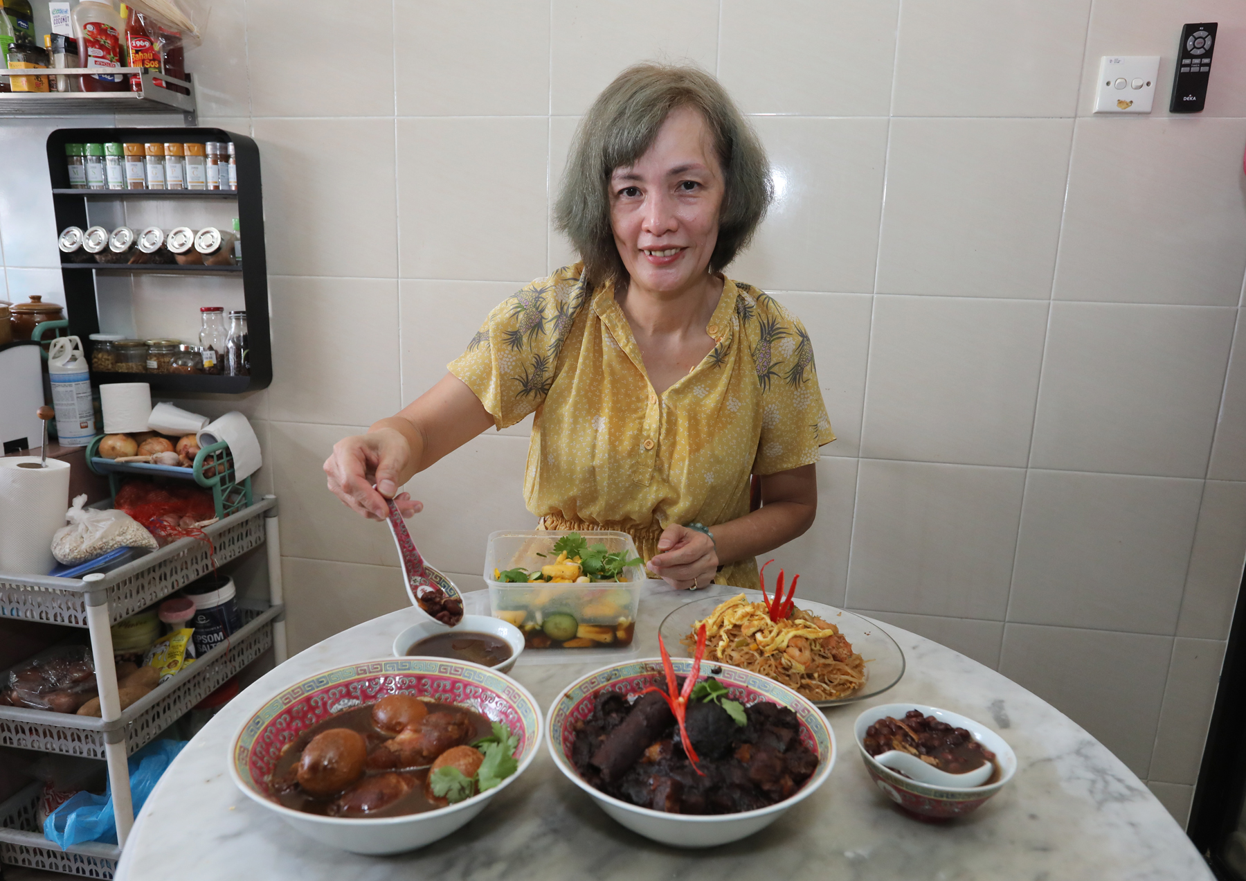 郭美丽传承前人手艺,自小学习不同传统风味菜肴