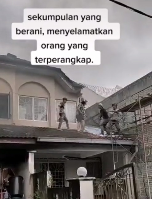 视频|惊见隔壁屋起火冒烟 2外劳英勇砸窗救人