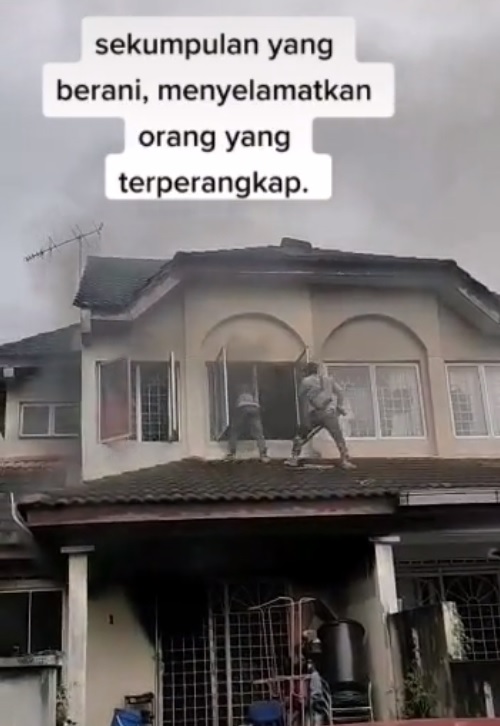 视频|惊见隔壁屋起火冒烟 2外劳英勇砸窗救人