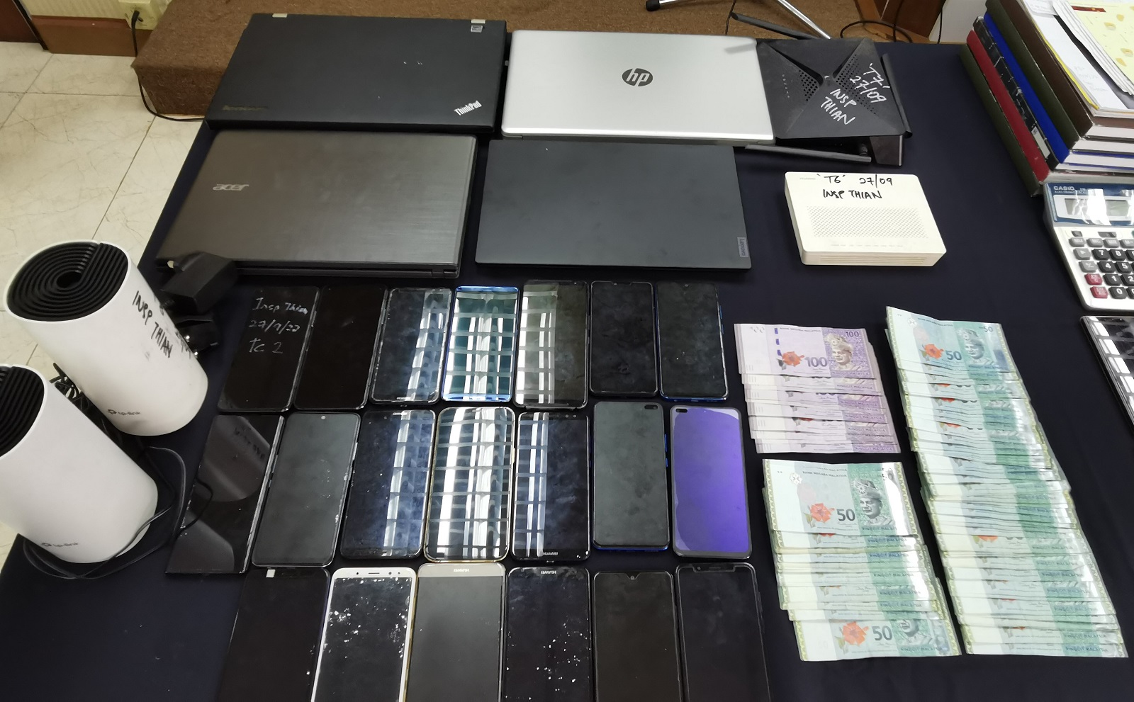 **己签发**柔:非非法集团在高级公寓设线上赌博呼叫中心,遭警一网打尽5男被捕