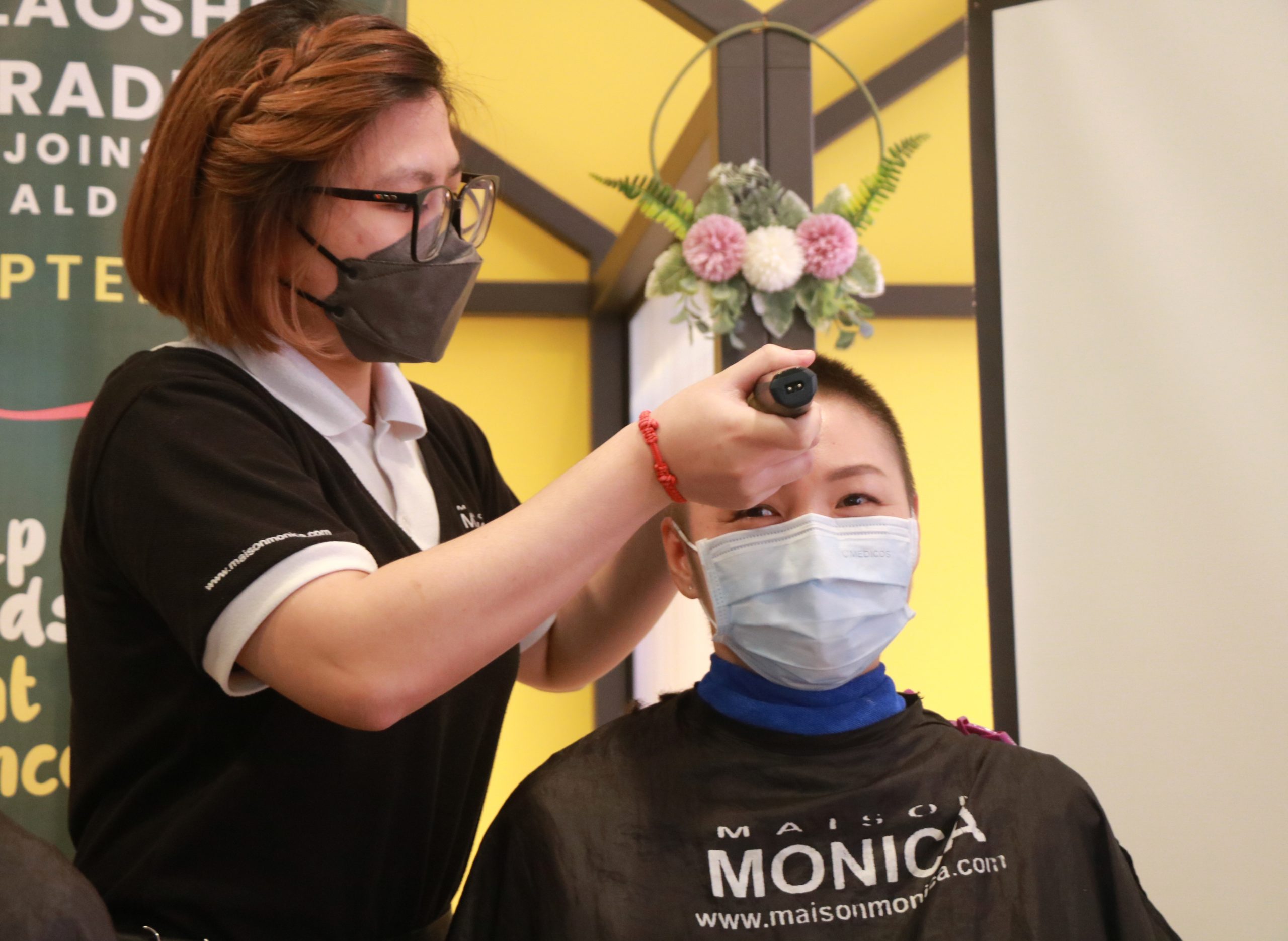 为癌童齐齐落发