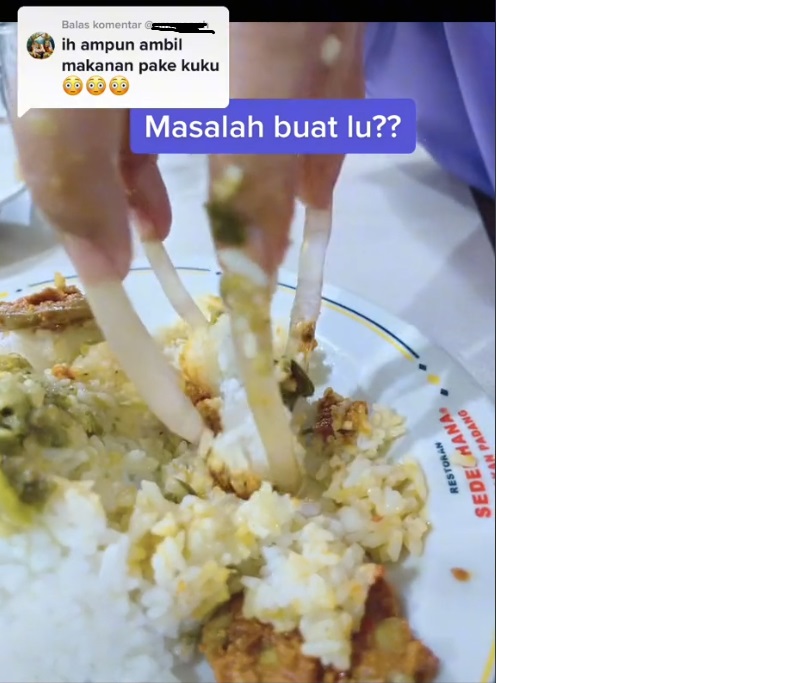 视频|女子长指甲像树根 当筷子夹饭菜吃