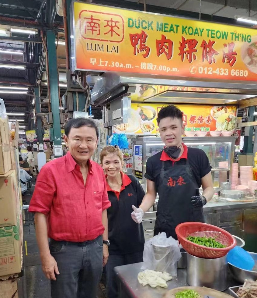 （全国版）小贩：塔辛主动合照