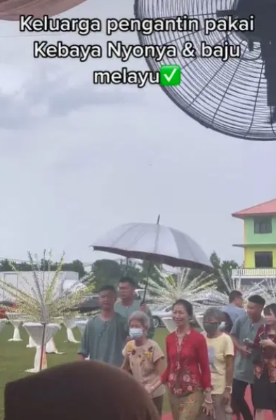 2/10见报∕我们∕次文∕华裔新人行马来婚礼 网赞:真正的大马一家