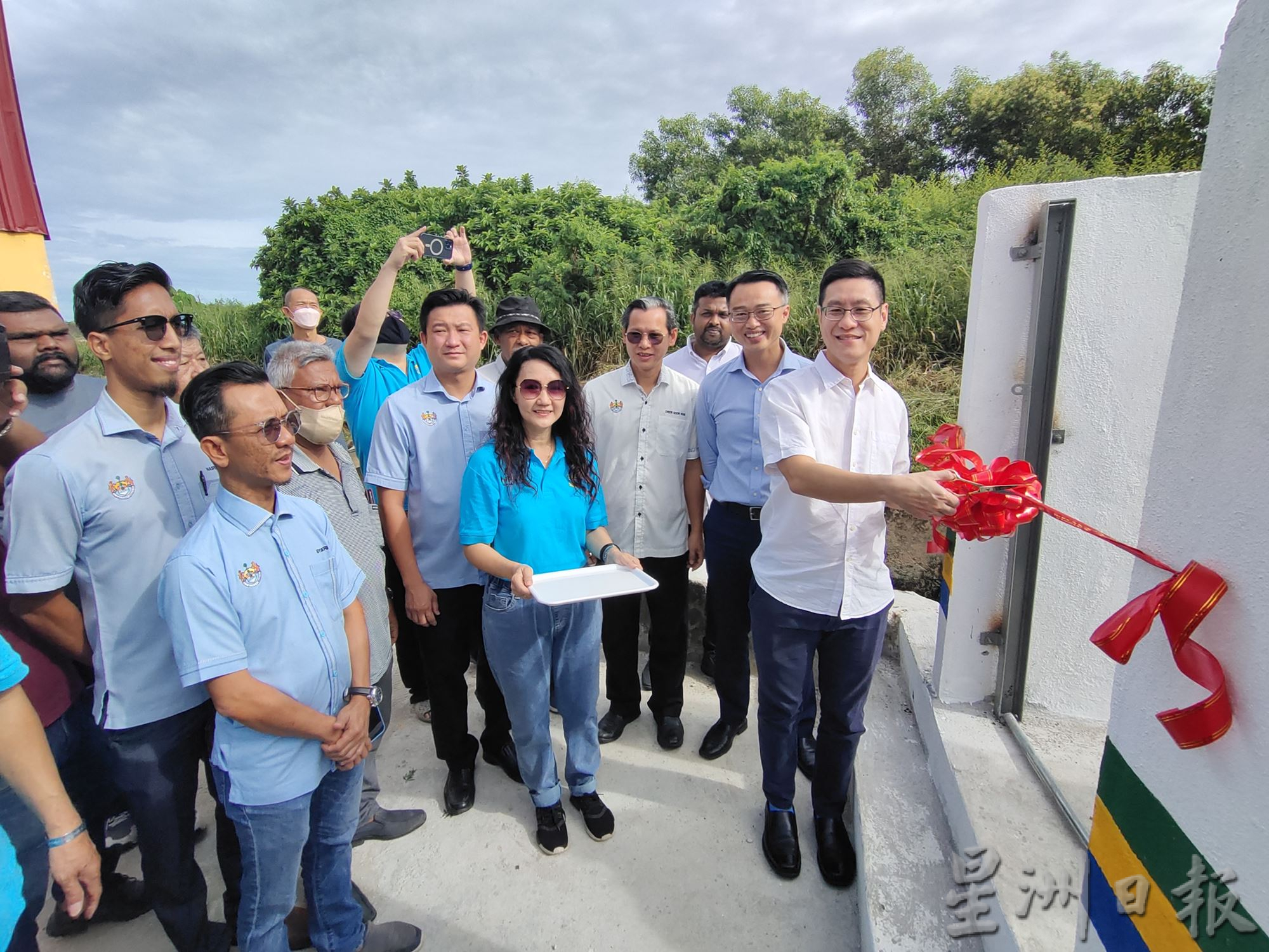 （大北马）再里尔为忠英园治水计划的泵房主持启用礼