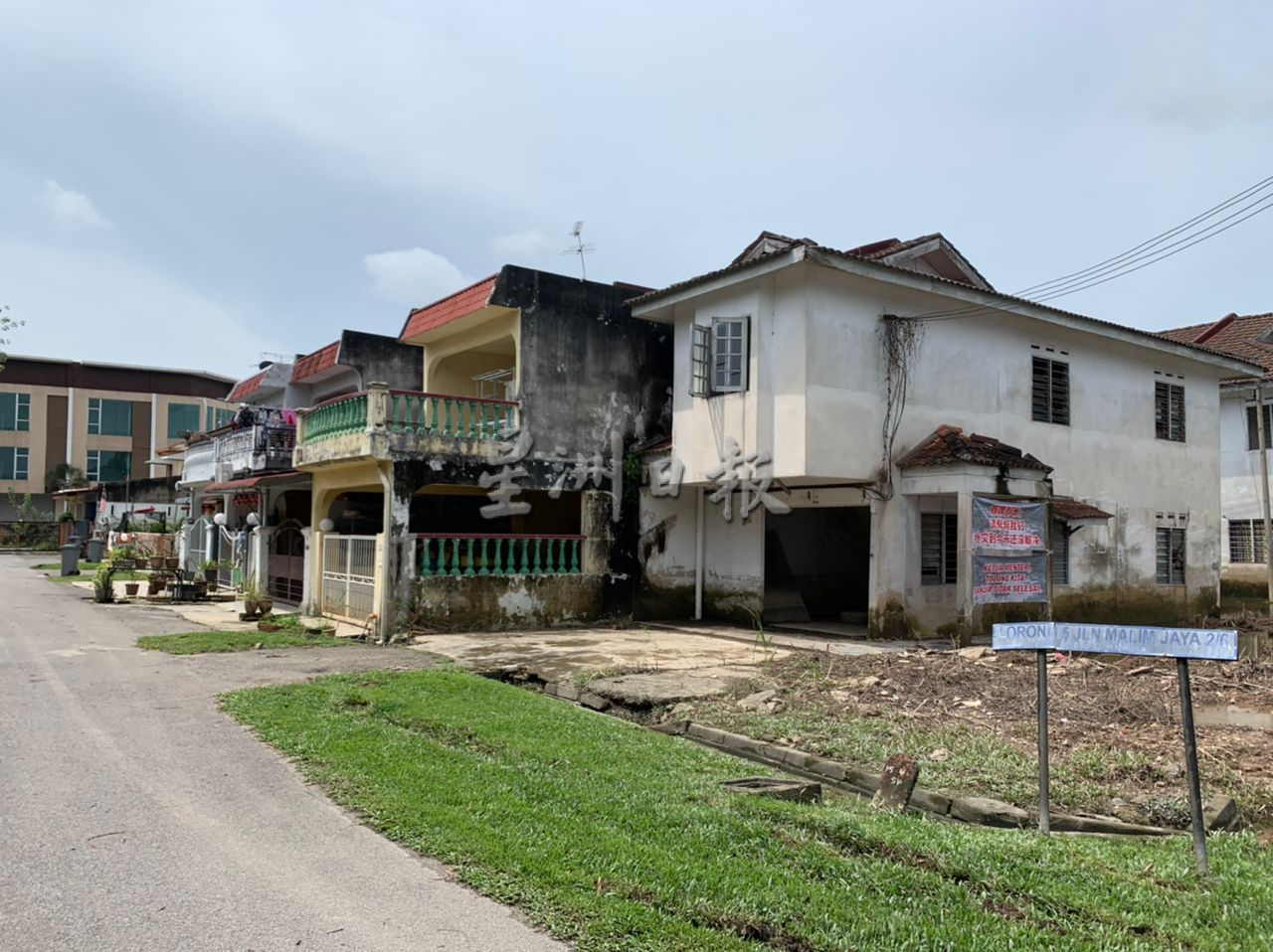 玛琳挂布条仍淹3次 州政府仍无动于衷