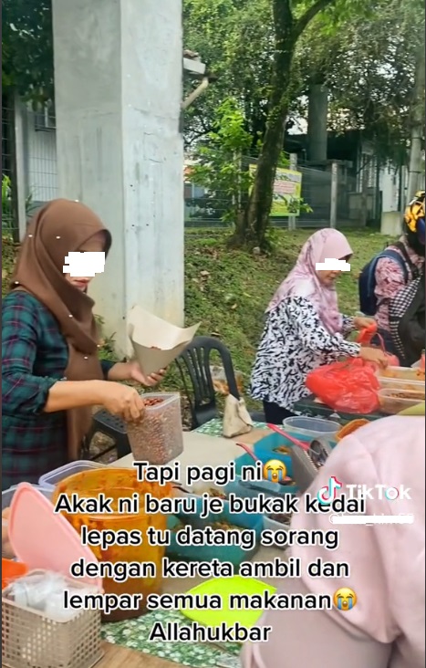 甫开档遇“疯子”捣乱 女摊主强忍泪水做生意