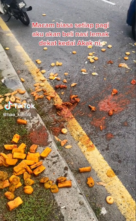 甫开档遇“疯子”捣乱 女摊主强忍泪水做生意