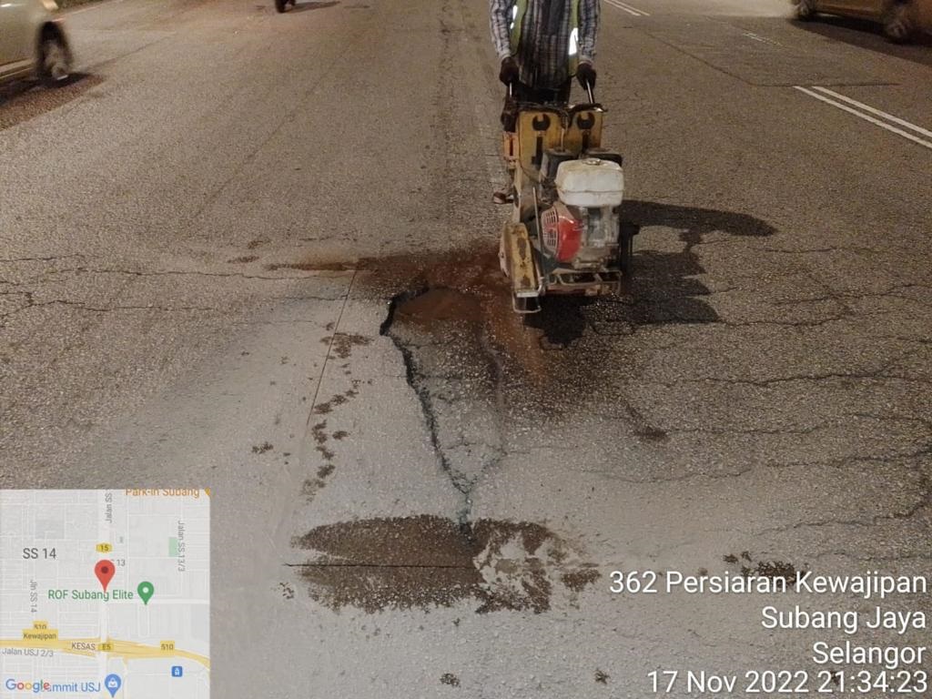 雨后积水成“推手” 道洞大增成陷阱