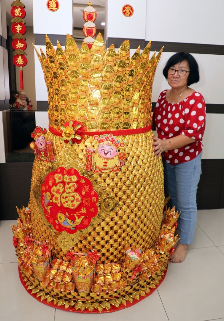15日见报(新年特稿)大都会/纸折金黄梨