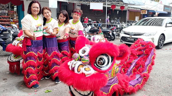 Lion dance performance by older women