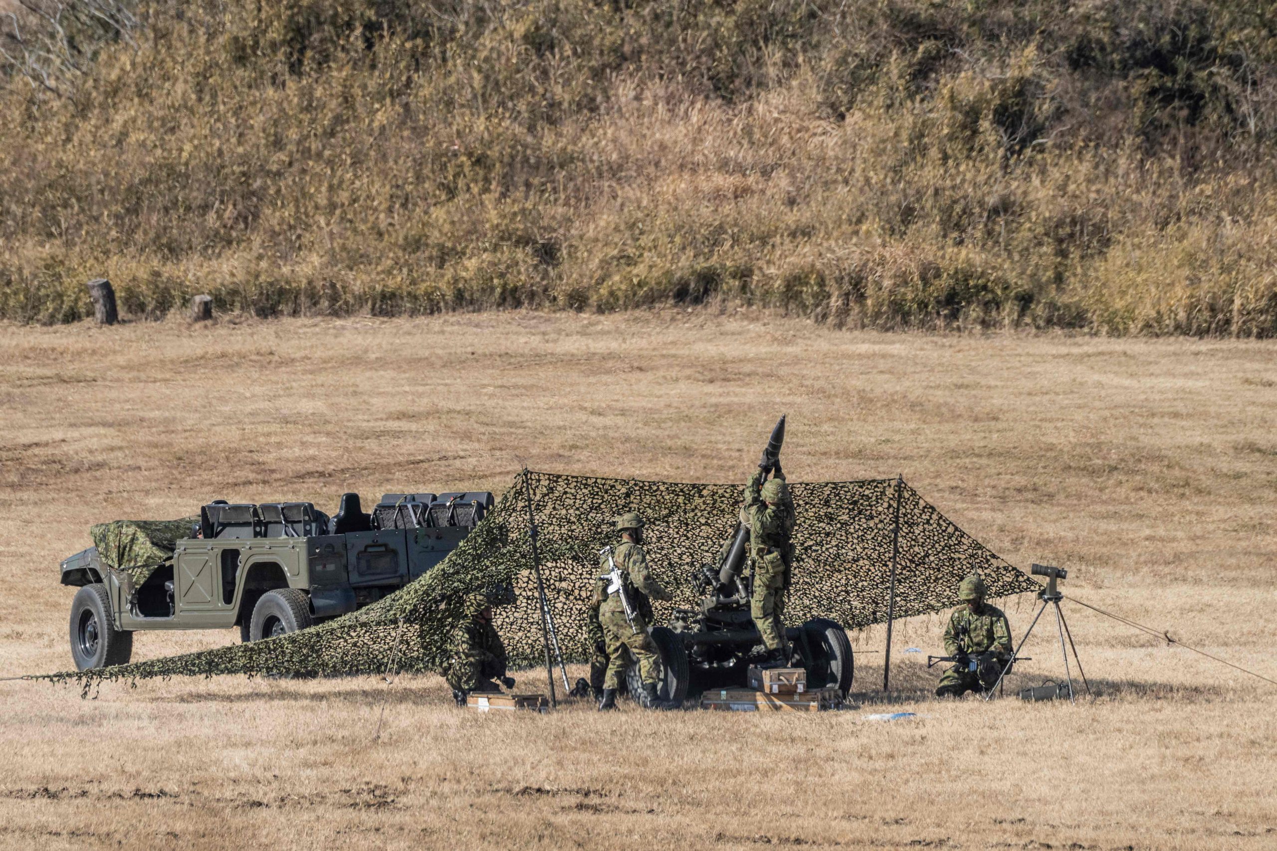 配在日本相关文,两图)日本军演