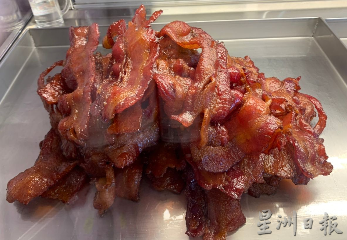 （古城封面主文）古城年货热起来 海味年饰肉干热销