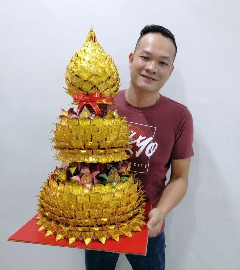 折金纸考耐性需巧手,刘顺安无意中激发兴趣,成折金纸达人