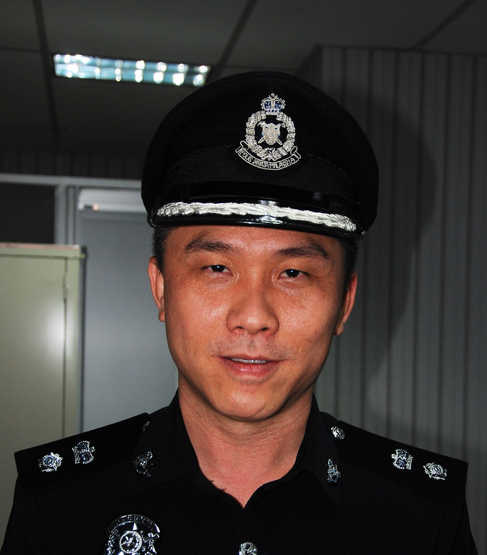 仁保警方扣捕通缉犯助查康乐花园入屋偷窃案